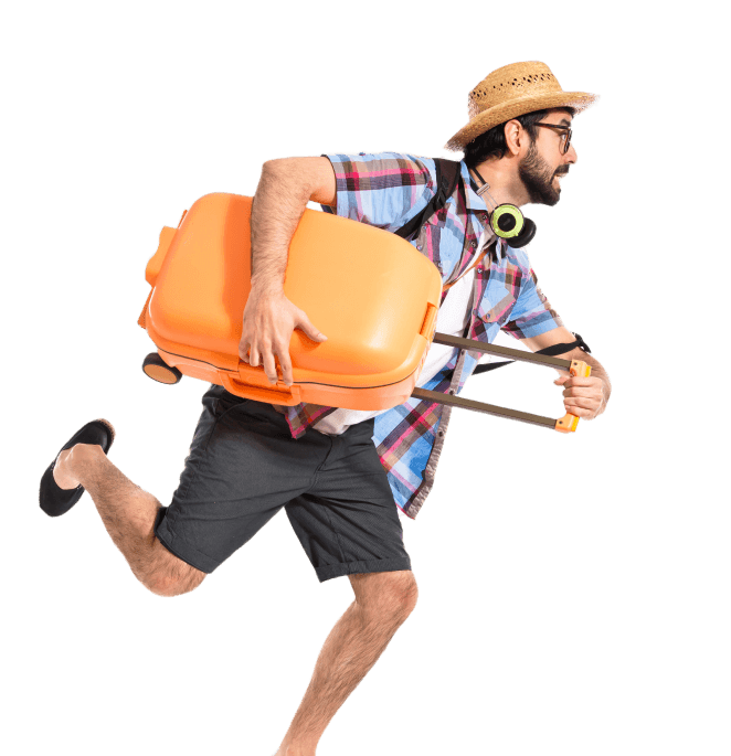 Man on vacation running holding his luggage
